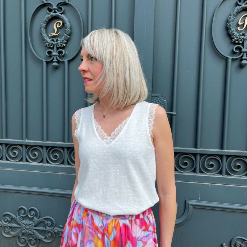Dénardeur blanc irisé pour femme. Le débardeur blanc irisé par exellence.