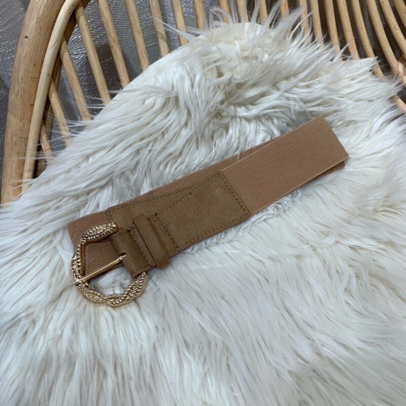Ceinture élastique beige pour femme.